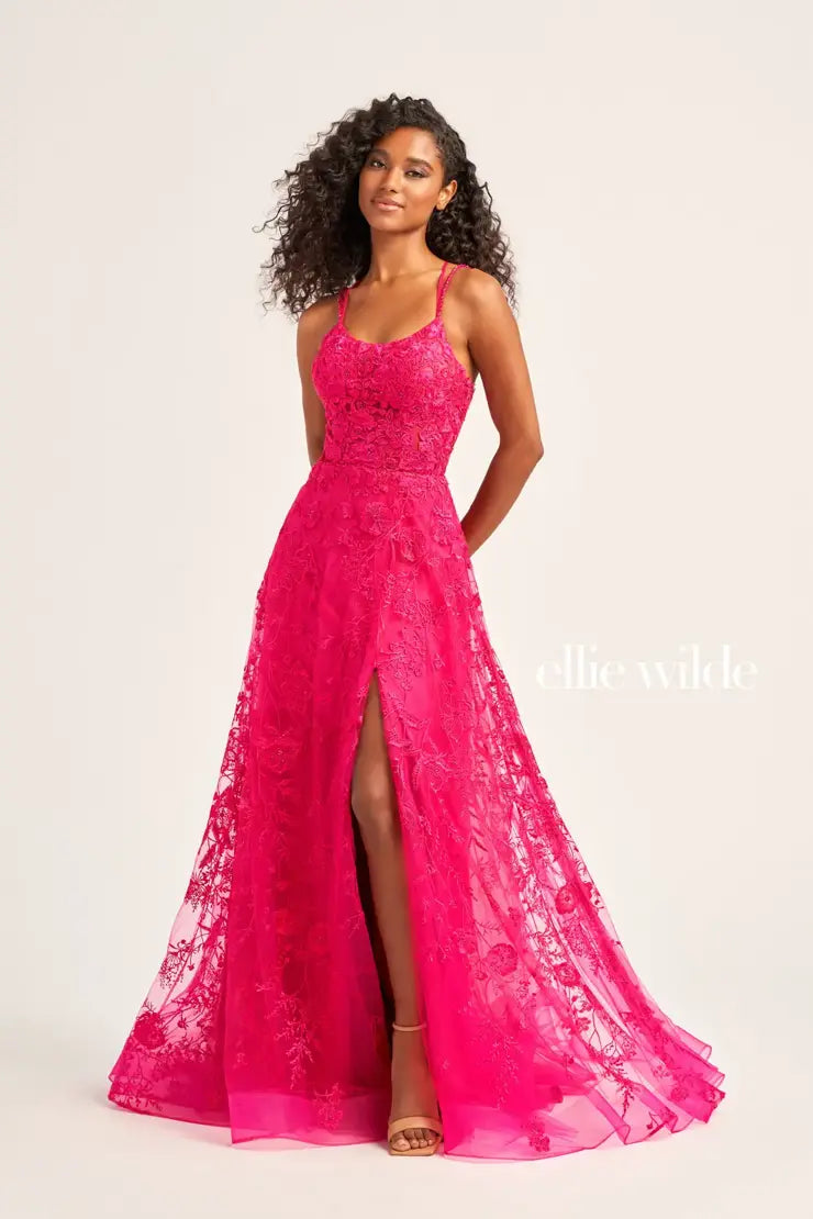 Feel like a modern day princess in this enchanting long dress by Ellie Wilde, style EW35012. Featuring an a-line silhouette with a scoop neckline that has beaded delicate straps that lead to a corset lace up back. This ensemble is fully adorned with gorgeous applique, fabulous embroidery and glistening beadwork.
