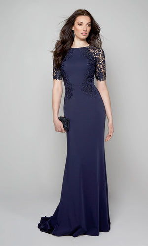 This Alyce Paris 27585  mother of the bride dress is styled in stretch crepe with lace accents, with a jewel neckline and short sleeves. This slim-flare formal gown exits with a partial illusion back and a sweep train