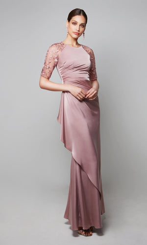 This elegant long dress is made of faille fabric, with a stunning high, scoop neckline, and short sleeves. There is a center zipper that is used to close the dress's back. The layered skirt has a fitted silhouette and glides elegantly