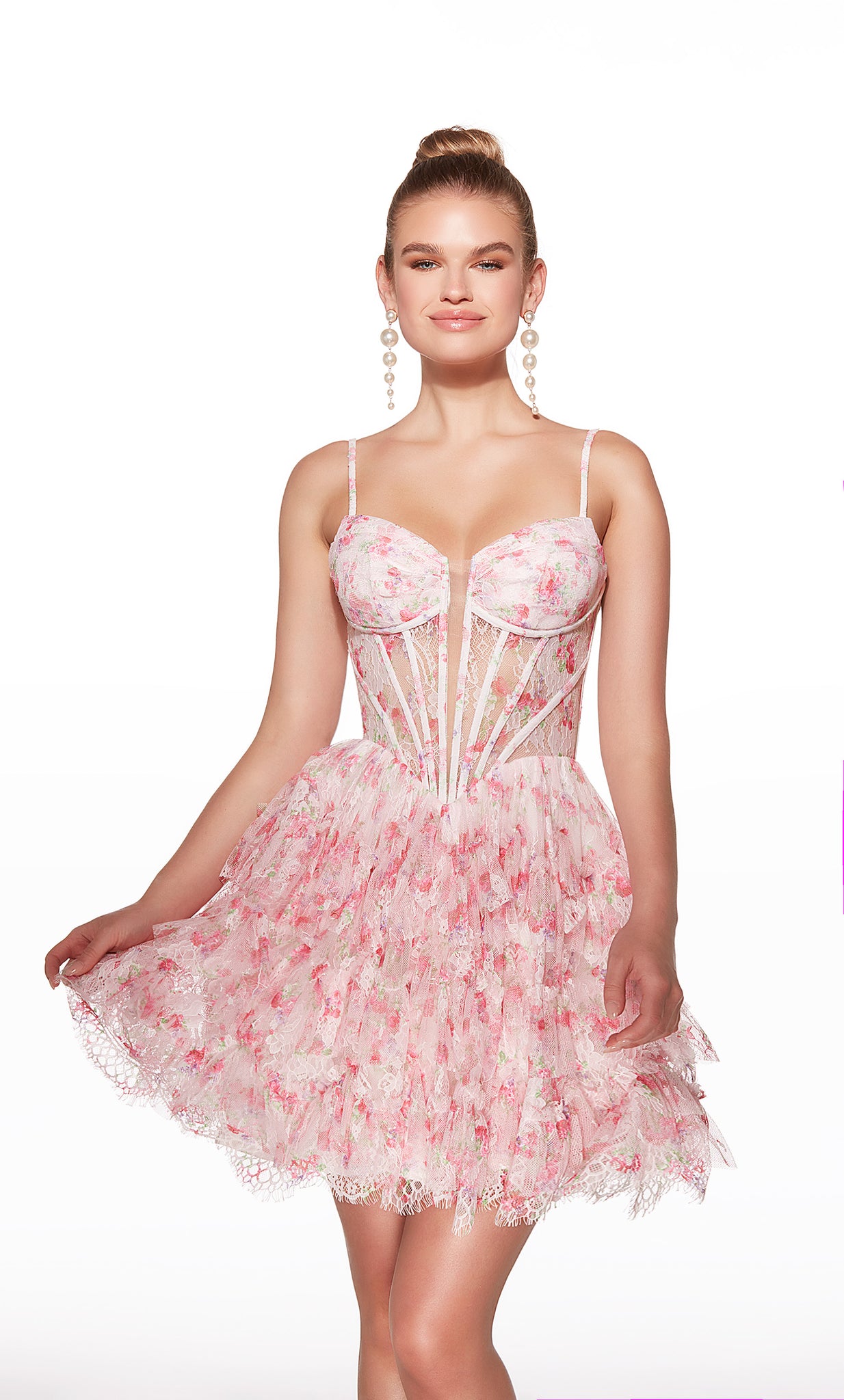 Woman wearing a pink floral dress on a white background