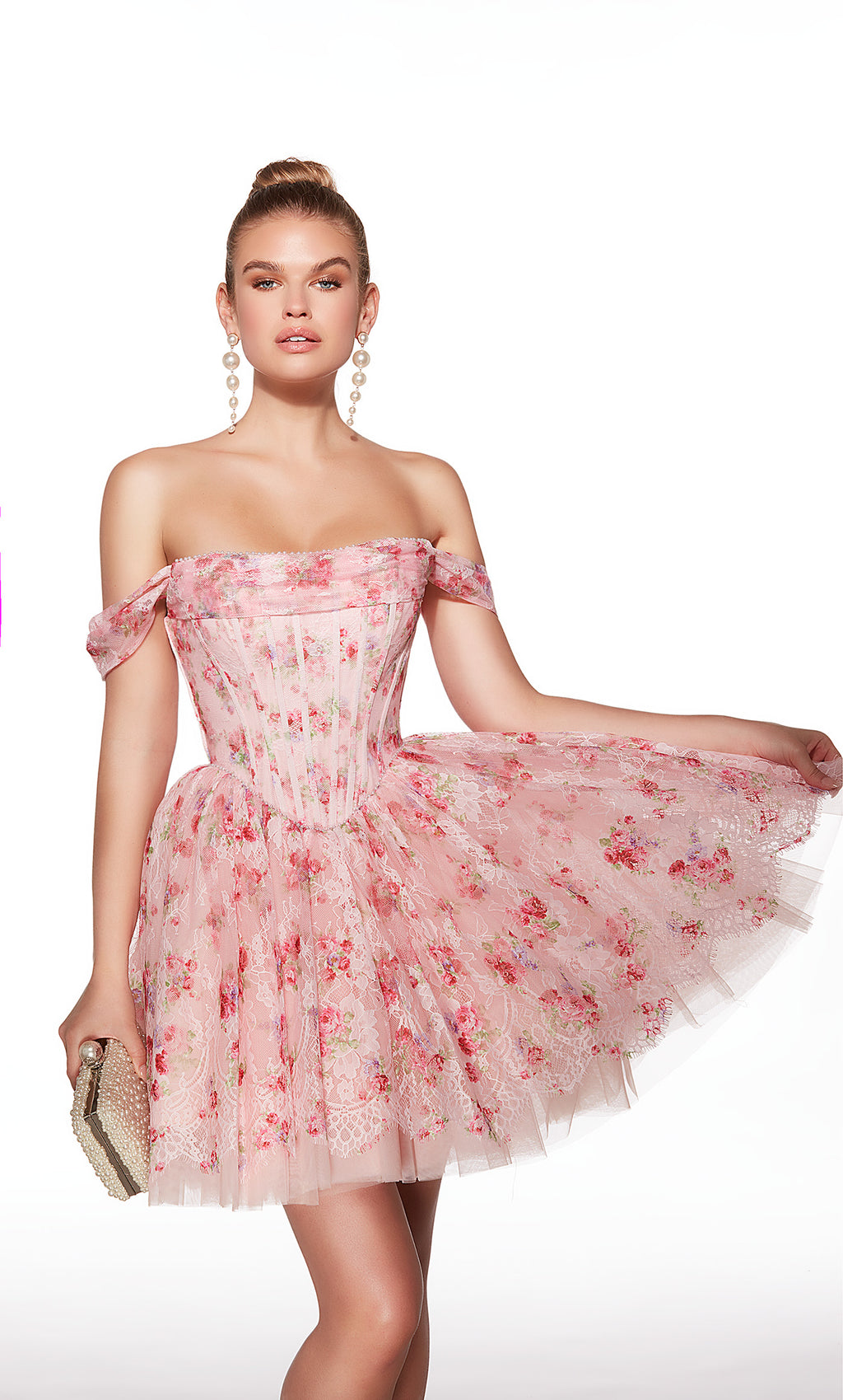 Woman wearing a pink floral off-shoulder dress on a white background