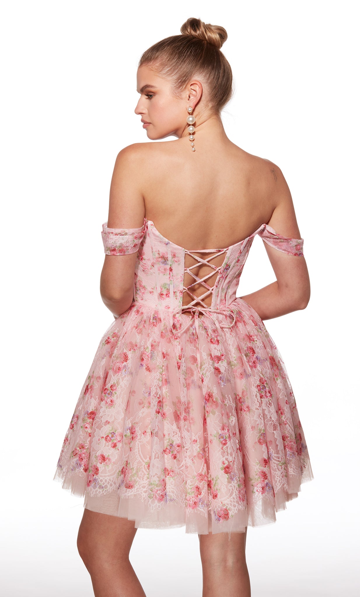 Pink floral off-shoulder dress with criss-cross back on a white background