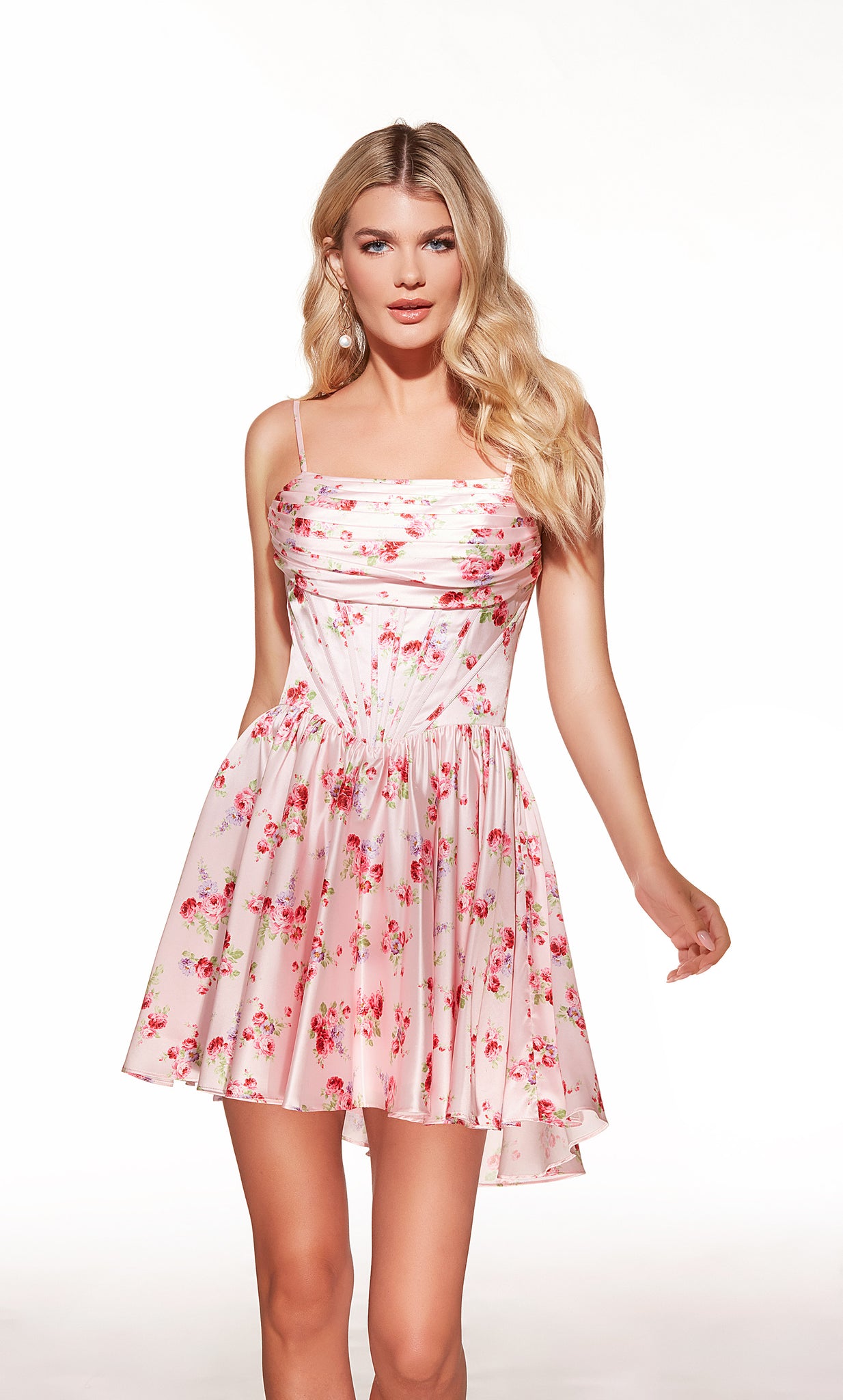 Woman wearing a pink floral dress on a white background