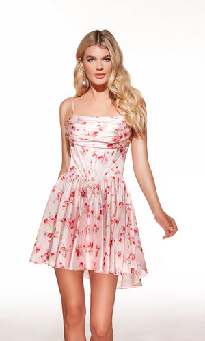 Woman wearing a pink floral dress on a white background