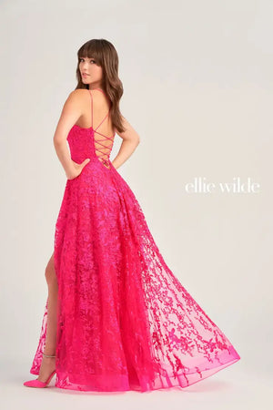 Dance the night away in this delightful a line dress Ellie Wilde dress EW35222. This romantic gown features an elegant scoop neckline and dainty thin double strap. Flattering on all, this enchanting gown accentuates your waistline highlighting your silhouette. Gleaming delicate lace embroidery adorns the entire silhouette giving this dress the perfect pop of sparkle. The playful skirt showcases a high appealing slit and flirty side pockets that add a charismatic touch.