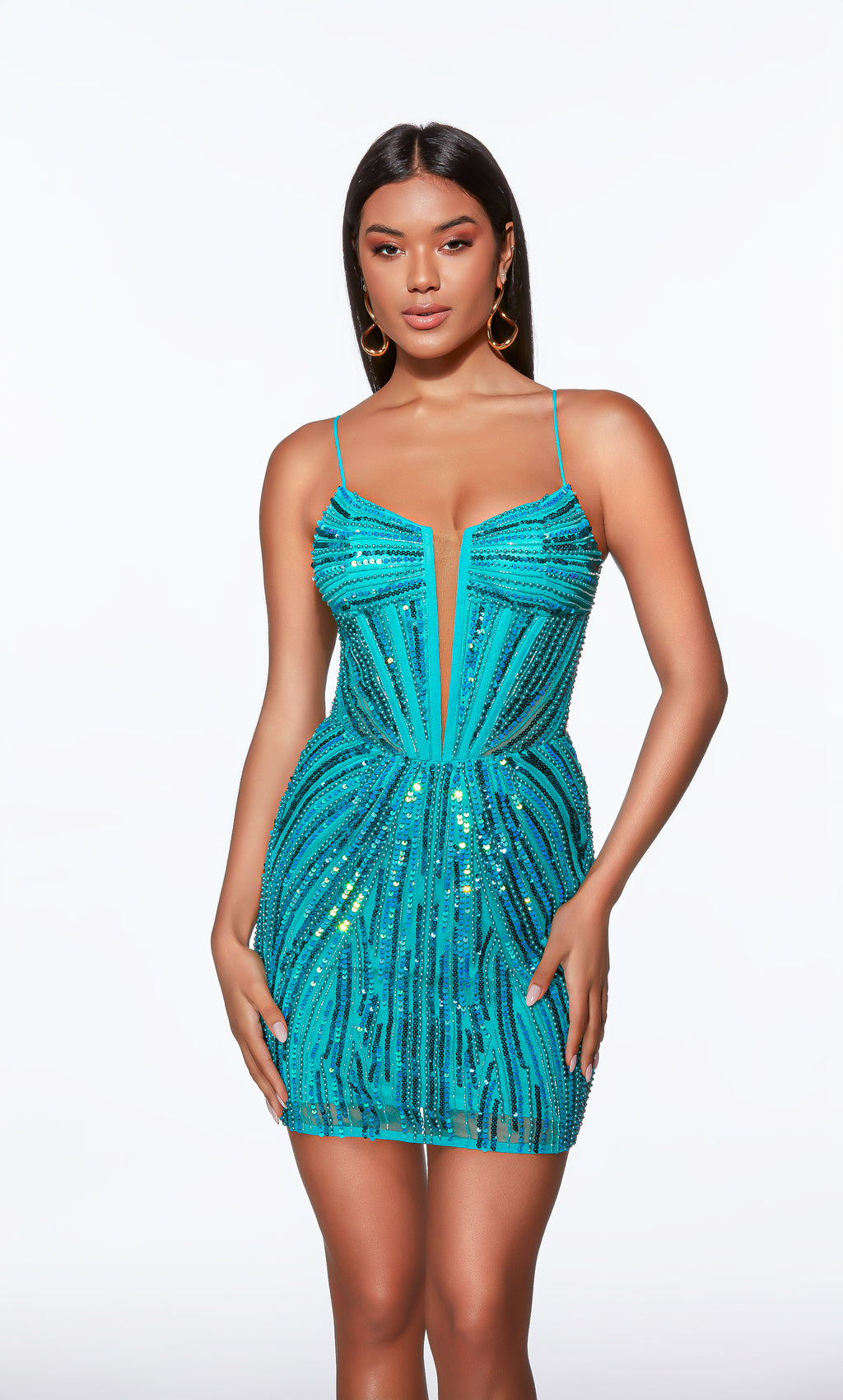 Teal sequin dress worn by a model on a white background