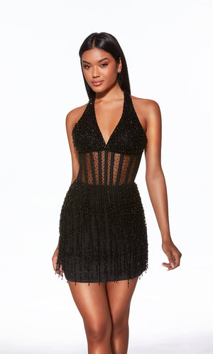 Black beaded dress worn by a model on a white background