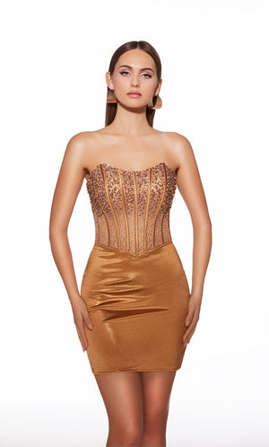 Woman wearing a bronze strapless dress with sequin bodice on a white background