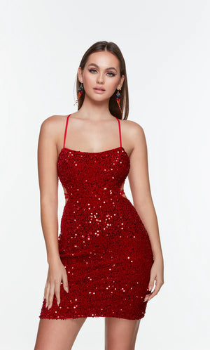 This fitted dress features a scoop neckline, with thin straps for support. The fully beaded bodice is covered in gorgeous sequins for just the right amount of sparkle. The back of this dress features a corset like lace up, adjustable for your likening, and a short zip up closure.