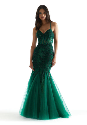 Have all jaws drop as you walk into your next special event while wearing this fabulous long dress by Morilee. style 47085. Showcasing a gorgeous fitted mermaid silhouette with a sweetheart neckline. The corset bodice of this ensemble is sure to hug your body gorgeously. This number is fully adorned with dazzling beadwork and beautiful applique.
