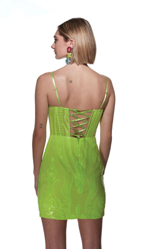 Stand out amongst the crowd when wearing this short&nbsp;fitted dress&nbsp;to your next special event style 4901 from Alyce. Featuring thin adjustable straps that transitions into a scoop neckline with mesh down the middle of the corset lace up back bodice. This number is adorned by dazzling sequins that form unique patterns that lays all over the dress.