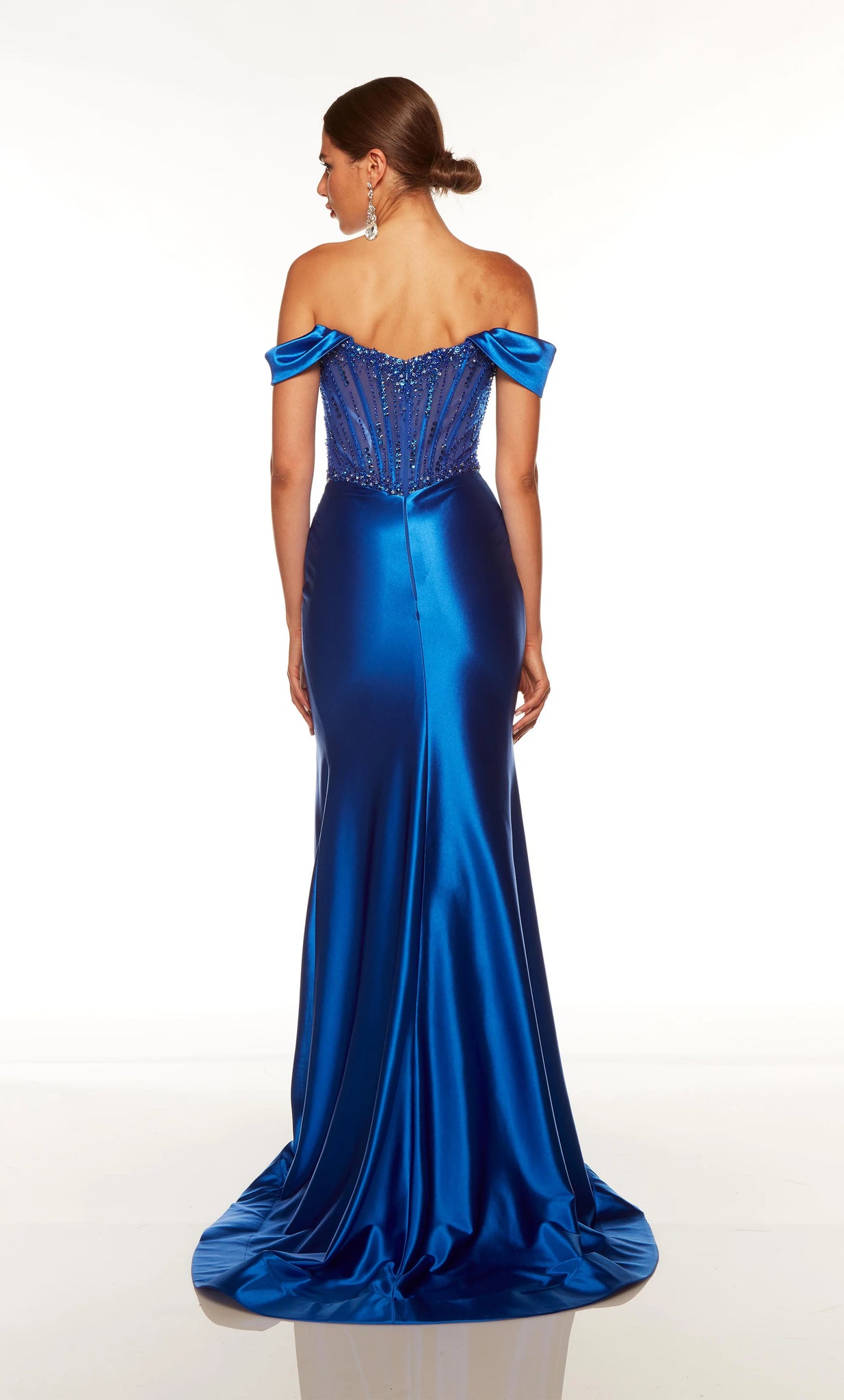 Alyce Paris 61471 royal blue formal gown features a sheer corset bodice with crystal beadwork and draped off-the-shoulder straps edging the curved neckline. The slight basque waist adds flair to this fitted prom dress, finished with a draped satin skirt with a thigh-high slit, horsehair hem, and sweep train.