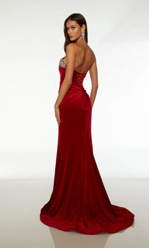 Strike a pose in this long glamorous sophisticated gown by Alyce 61487. Featuring a classy strapless neckline with a simple v cut neckline adorned with beadwork adorning the neckline. Made entirely in a flattering velvet material for an extra classy look. A sweep train is added to complete the look.