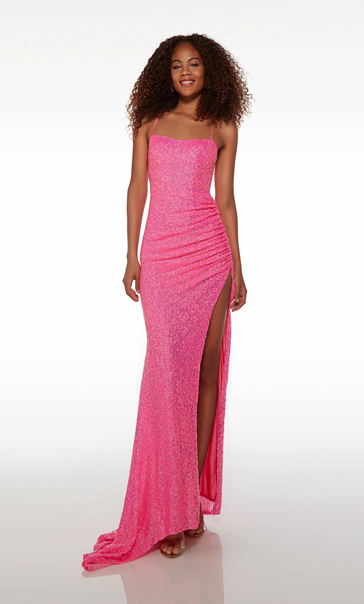Shimmer onto the dance floor in this phenomenal fully sequined Alyce Paris dress 61519. Fun and flirty, this gorgeous gown features a chic scoop neckline and dainty thin straps. The flattering lace up closure accentuates your curves highlighting your figure beautifully. The slim fitted skirt highlights an alluring high slit perfect for a grand exit.