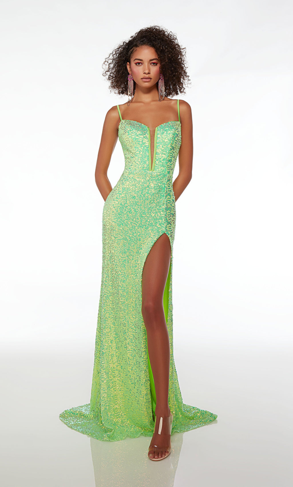Dazzle all night long at your prom wearing this scintillating Alyce Paris long dress style 61556 completely embellished in shiny sequins. This shimmering gown showcases a plunging V neckline with illusion insert, adjustable spaghetti straps and cut out strappy low back. The long slim skirt has a high front side slit and sweep train.
