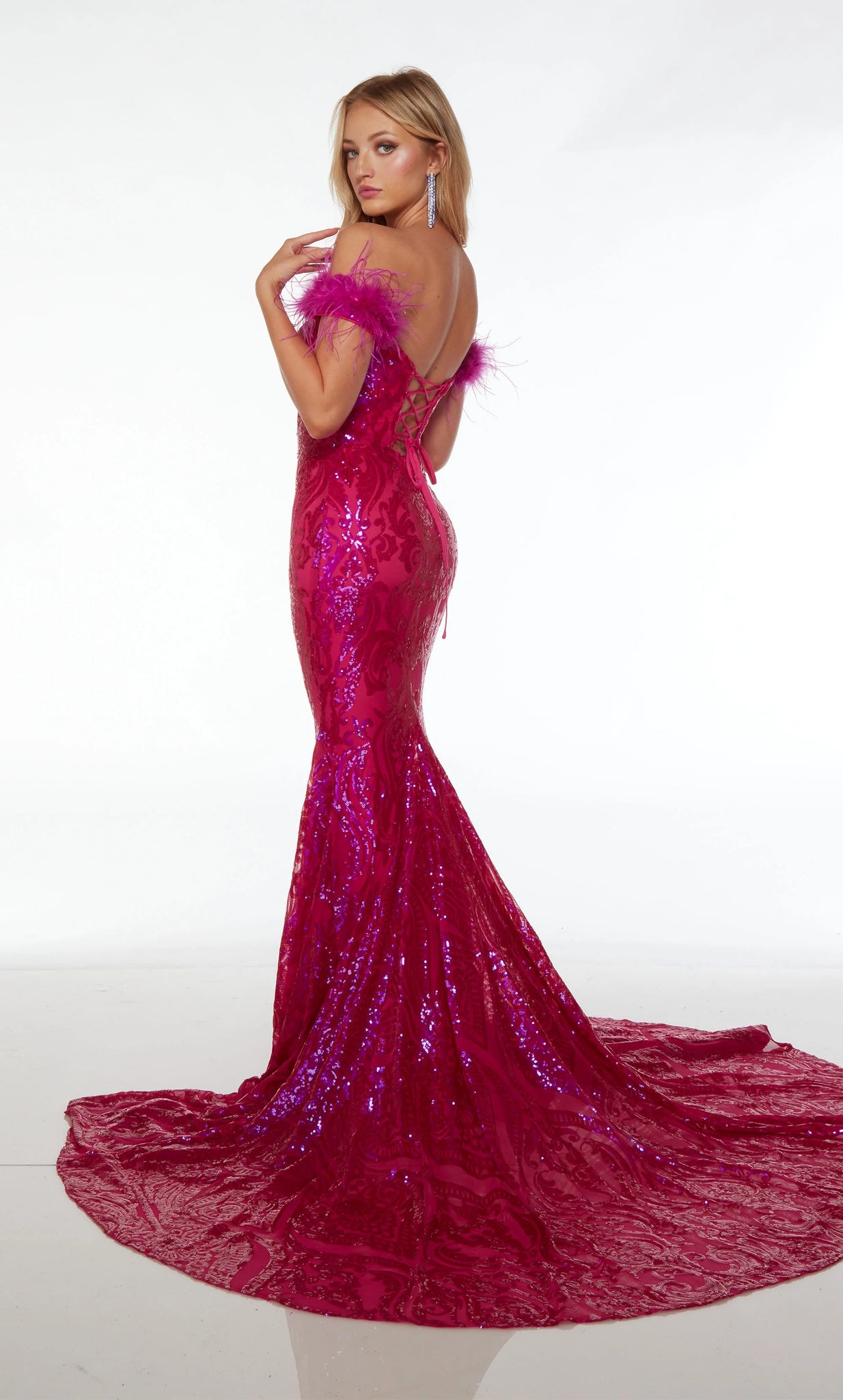 Dare to stand out at your event with this lavish Alyce Paris fitted prom dress 61595. From top to bottom, eye catching sequin patterns are featured to give you elegance and shine throughout the entire dress. The adjustable bodice and strapless neckline are complemented by soft off the shoulder feathered cap sleeves. 