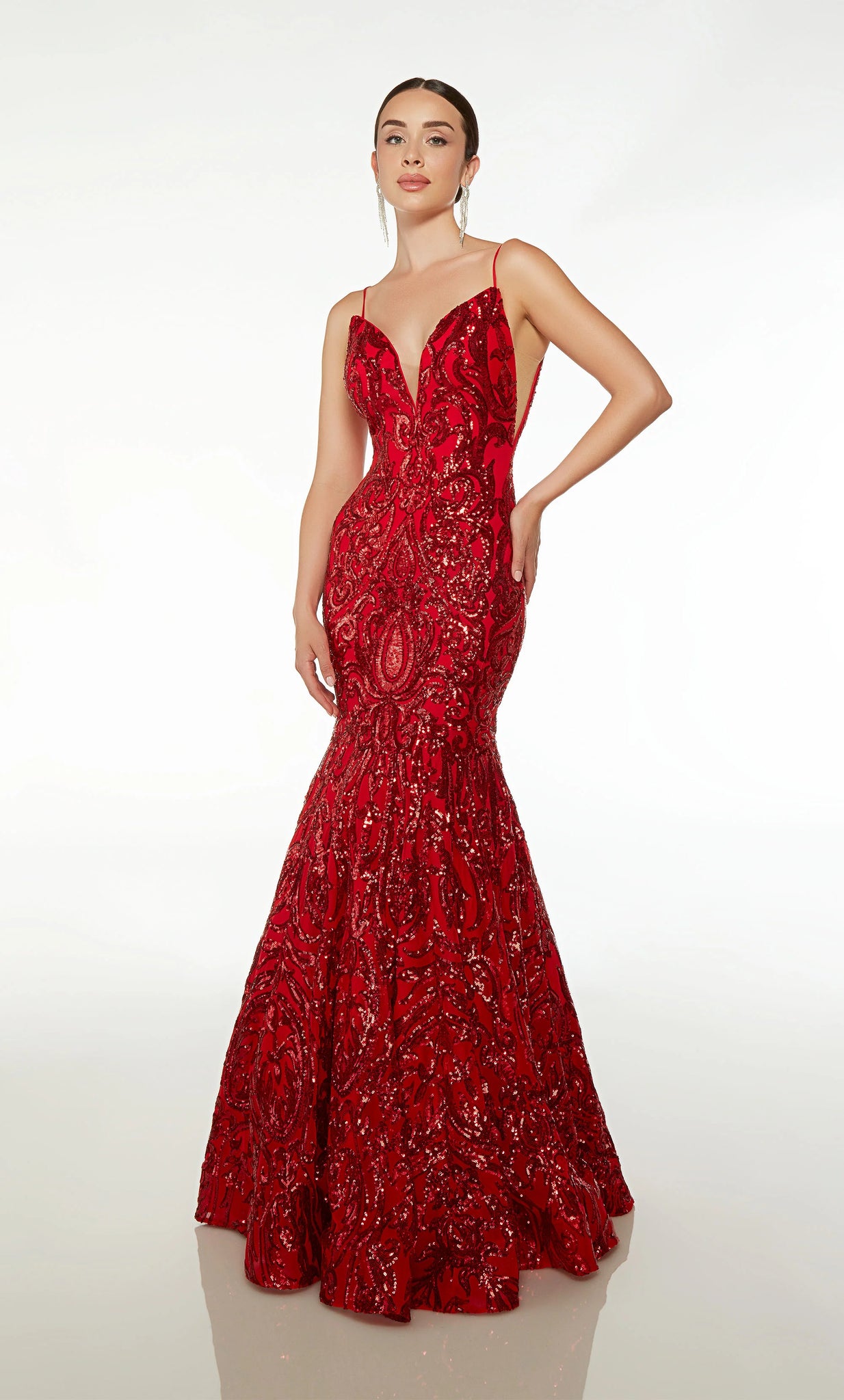 Turn heads when you step into the room wearing this captivating fully beaded Alyce Paris long prom dress 61607. The fitted zip up bodice features a trendy V neckline and the skirt has a long glistening sweep train. Whimsical sequin beaded patterns adorn the entirety of the dress giving you ideal radiance and detail.