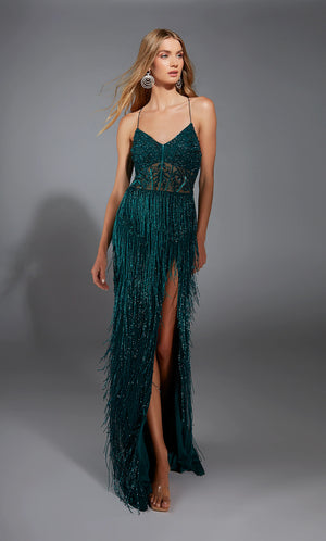 Amp up the drama in this glamorous long dress by Alyce Paris, style 61788. Showcasing a fitted silhouette with a modest v neckline that has delicate straps that lead to a sexy open back. This ensemble is fully adorned with glistening sequins and dazzling beadwork, the perfect final touches is the fringe detail in the skirt and the thigh high slit.