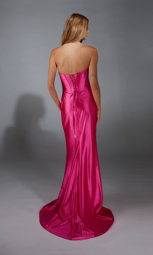 Less is definitely more especially when wearing this elegant&nbsp;long dress&nbsp;by Alyce Paris, style 61790. Showcasing a fitted silhouette with a strapless scoop neckline. This number is fully made out of stretch satin material. Glistening beadwork adorns the thigh high slit. The back of this number consists of a gorgeous corset lace up back.