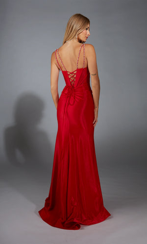 The classy long gown style 61830 by Alyce Paris is the perfect&nbsp;prom&nbsp;choice. Featuring a fitted corset lace bodice detailed with a plunging v neckline delicately adorned with glistening beadwork along the trim of the dip and cascades up the neckline into the spaghetti straps. Made from a jersey material that will hug and flatter the body effortlessly.