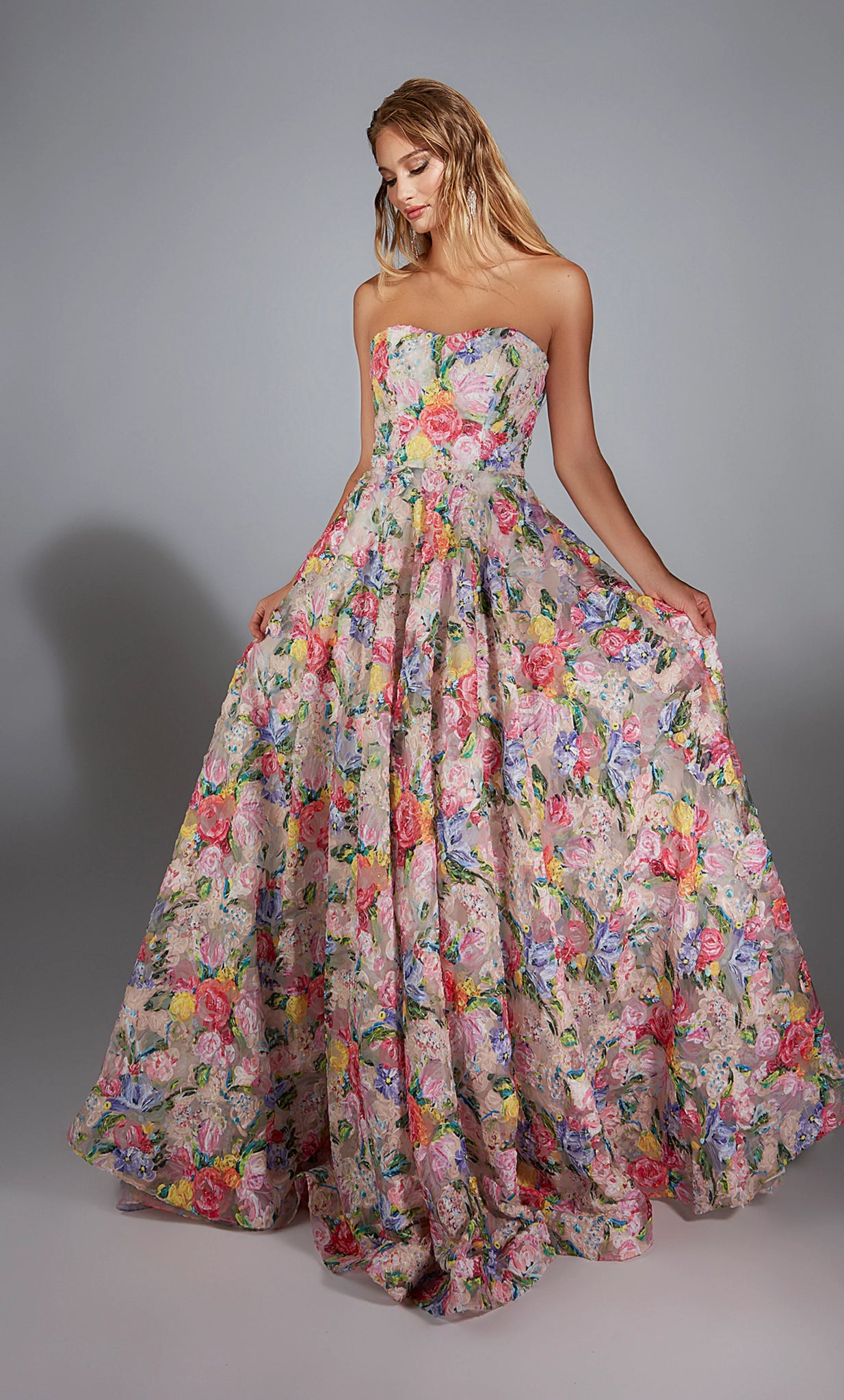 Make a lasting impression in this gorgeous fashion forward long dress by Alyce Paris style 61913. The floral inspired lace material makes this dress a one of a kind. The strapless sweetheart neckline has the ball gown skirt flow effortlessly from you waist.