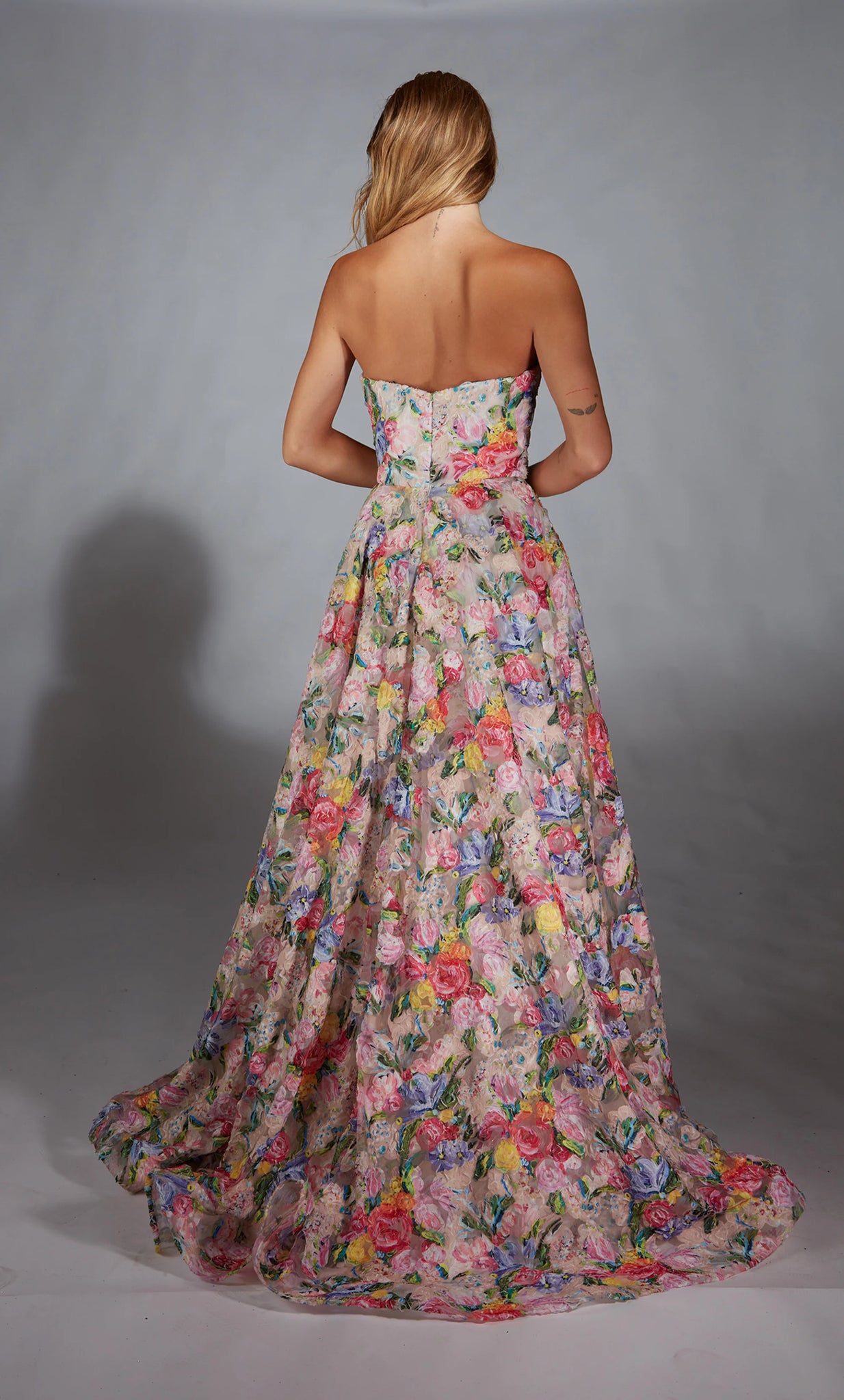 Make a lasting impression in this gorgeous fashion forward long dress by Alyce Paris style 61913. The floral inspired lace material makes this dress a one of a kind. The strapless sweetheart neckline has the ball gown skirt flow effortlessly from you waist.