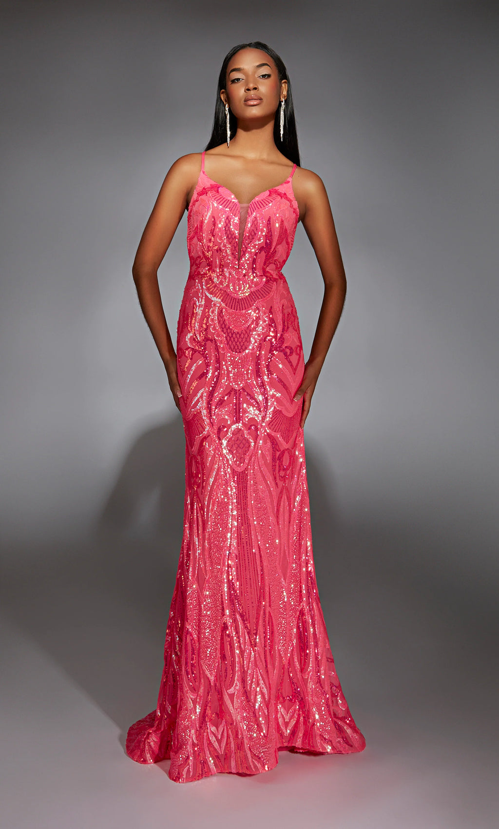 Have all jaws drop as you enter the room wearing this glamorous long dress by Alyce Paris, style 61930. Showcasing a beautiful v neckline with straps that lead to an open back. The gorgeous beaded sequins pattern is extremely flattering and goes all the way to the hem of the dress.