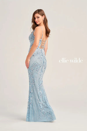 Have an everlasting sparkle when you wear this fully beaded Ellie Wilde prom dress EW35065. This fitted dress features an adjustable fitted bodice with a V-neckline that features adjustable shoulder straps for the perfect fit. Symmetrically sewn beaded patterns give you a radiant shine throughout the entire dress.