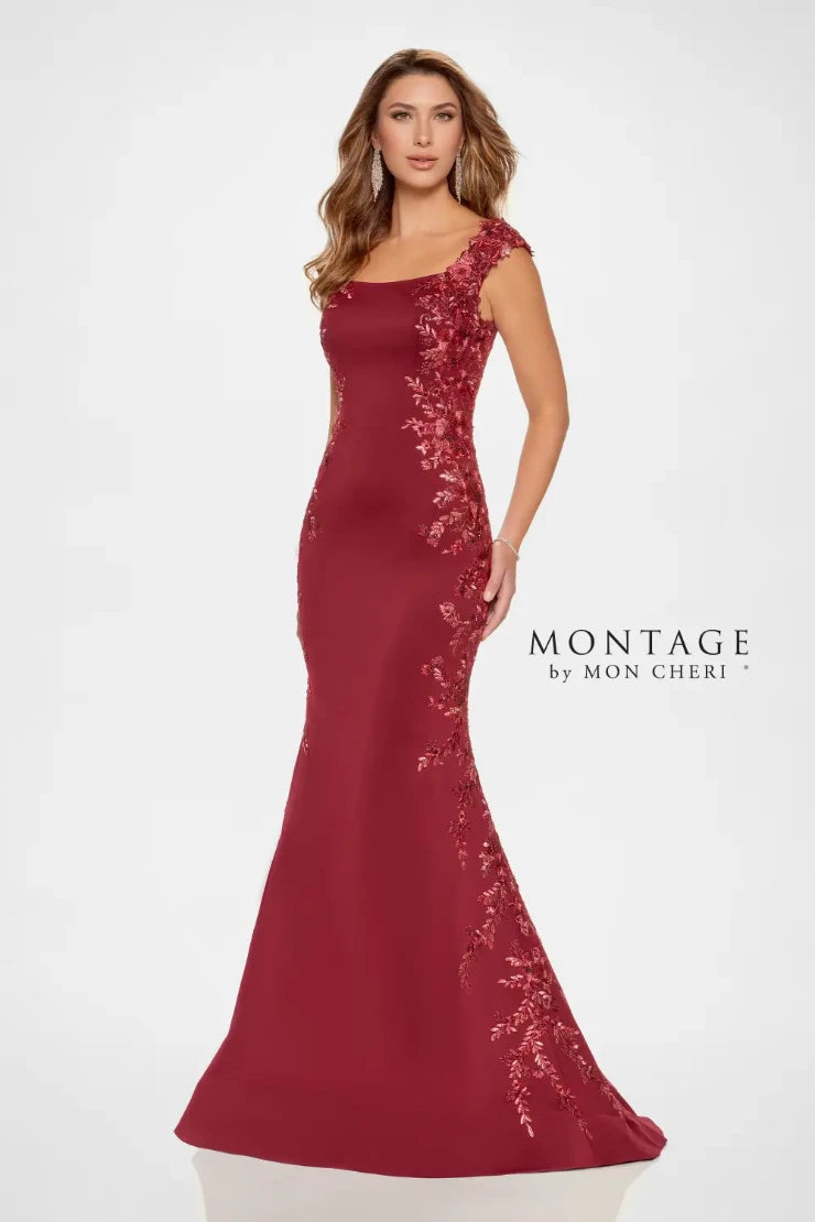 This gown exudes understated elegance. The softly structured bodice is beautifully adorned with delicate floral lace appliqué to highlight your waistline. The timeless bateau neckline and chic cap sleeves bring classic charm, while the fit-and-flare silhouette perfectly flatters your figure, delivering a look that’s both sophisticated and stunning.