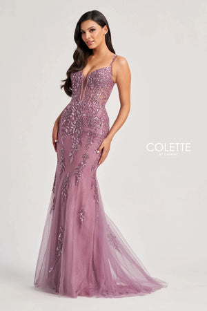 Feel classy and elegant when wearing this long&nbsp;fitted dress&nbsp;by Colette, style CL8210. Showcasing a plunging v- neckline with delicate straps leading to a sexy open corset lace up back that will hug your bodice beautifully all time. This ensemble has a unique see through corset top that's fully adorned with floral applique and dazzling beadwork. The bottom it's a straight fitted glitter tulle skirt that's fully embellished with glistening sequins designs. To amp up the drama it has a classy train.