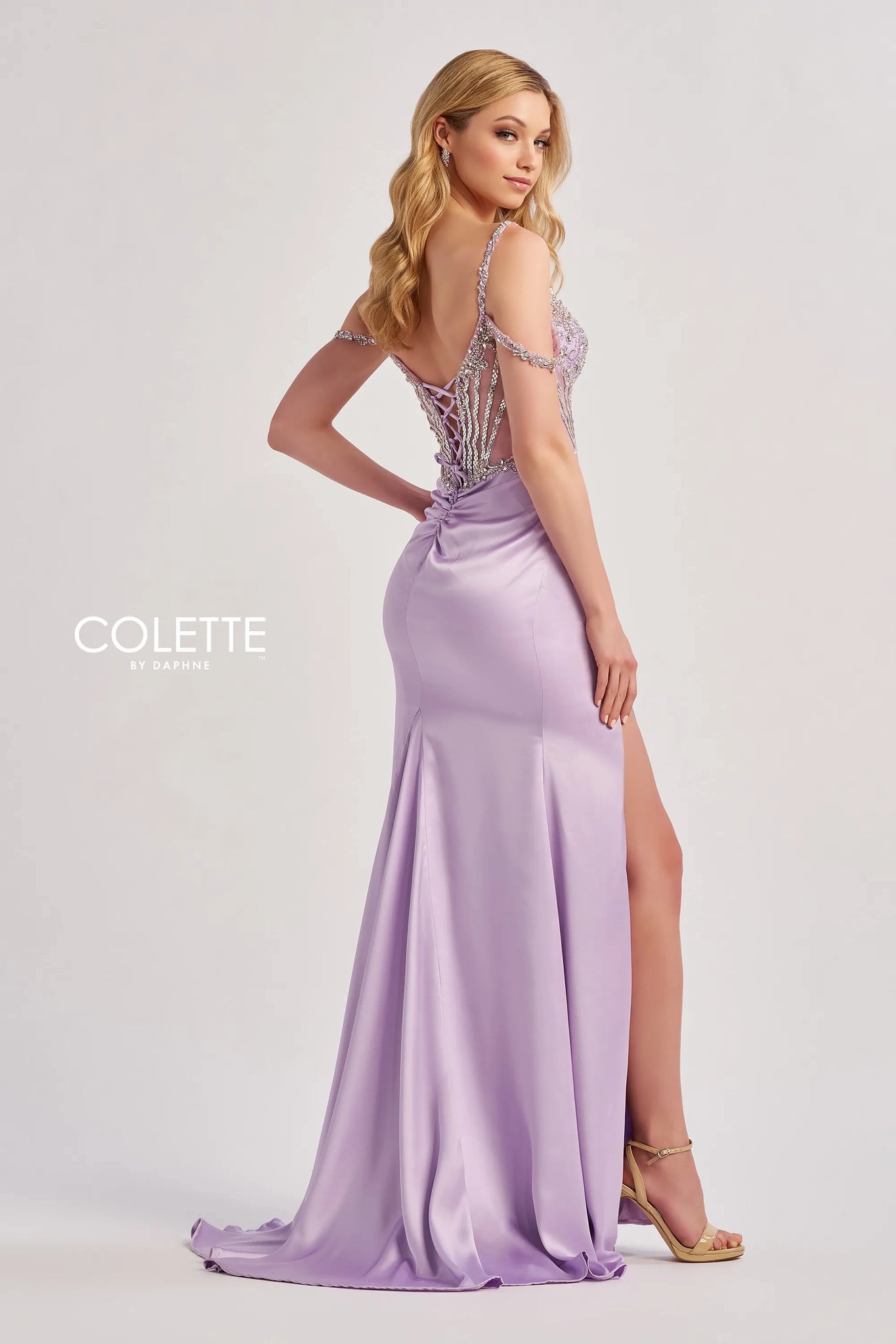 Have all eyes on you in Colette dress CL8460 that will be perfect for your special event. This classy and elegant dress showcases a v neckline with off the shoulder straps. The beaded corset bodice adds the perfect amount of sparkles. The fitted stretch satin skirt showcases a thigh high slit and sweep train.