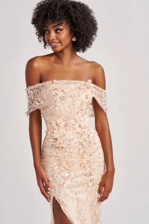Elevate your romantic style with this enchanting long dress, crafted from exquisite beaded embroidery and shimmering sequin tulle. The fit-and-flare silhouette beautifully accentuates your figure, while the off-the-shoulder straight neckline adds a touch of elegance. Adorned with three-dimensional flowers, this dress features a daring slit for added allure. Complete with optional spaghetti straps and a natural waistline, it’s perfect for making unforgettable memories.