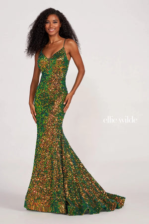 Be bold and vibrant in alluring long dress EW34016 by Ellie Wilde. This dress is made from jersey fabric that is entirely adorned in sequins to give you a flattered figure along with a vibrant sparkle to have all eyes on you. The fitted bodice features a V neckline supported by dainty thin straps that reveal a trendy and adjustable lace up closure. The side of the bodice displays sheer mesh cutouts that add drama to the dress. Make a statement with a long sweep train.