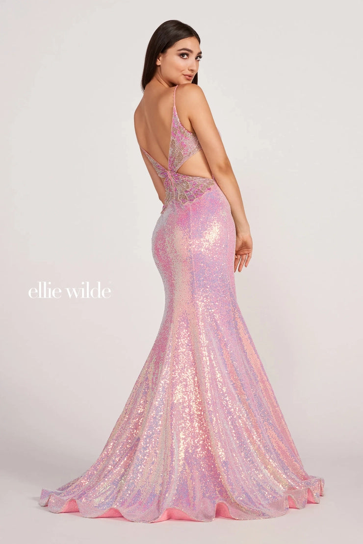 Have heads turn as you walk pass in the alluring long Ellie Wilde style EW34088. Featuring a slight plunging neck paired with side cutouts and an exquisite back detailed as a butterfly and will have people doing a double take. The fitted skit with thigh high slit is adorned with sequin all the way down to the train.