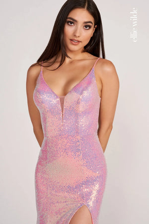 Have heads turn as you walk pass in the alluring long Ellie Wilde style EW34088. Featuring a slight plunging neck paired with side cutouts and an exquisite back detailed as a butterfly and will have people doing a double take. The fitted skit with thigh high slit is adorned with sequin all the way down to the train.