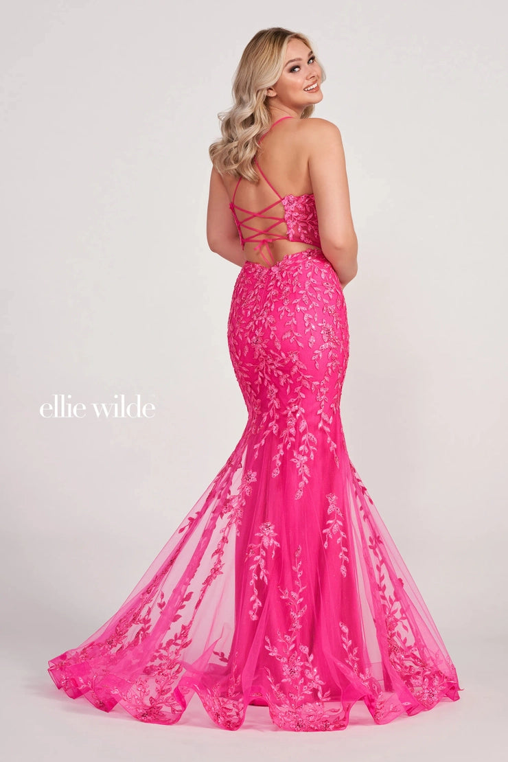 Be the center of attention with the bold colors tat come with this astonishing long style EW34090 by Ellie Wilde. Featuring the illusion bodice impressively adorned with embroidery lined with sequin and trickles down the entire silhouette and falls to the very trim of the sweep train to have you illuminating perfectly in every photo.