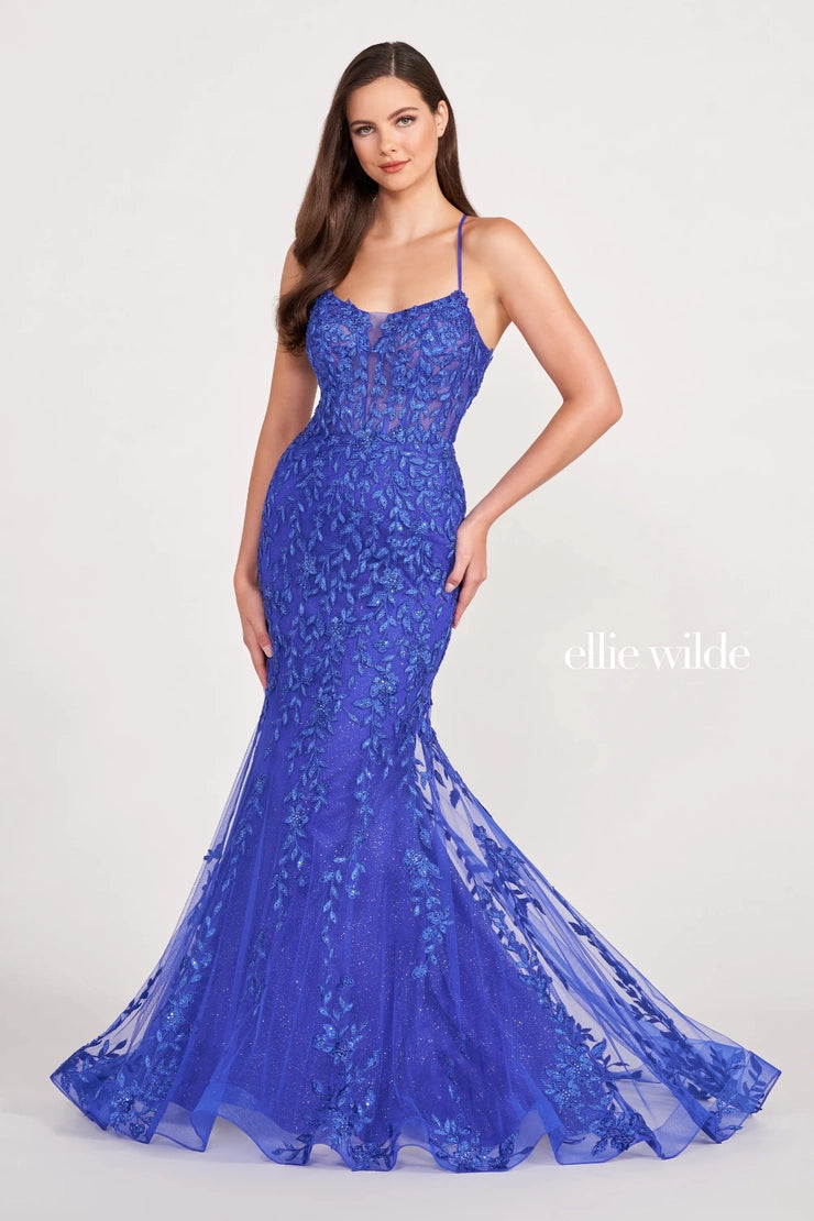 Be the center of attention with the bold colors tat come with this astonishing long style EW34090 by Ellie Wilde. Featuring the illusion bodice impressively adorned with embroidery lined with sequin and trickles down the entire silhouette and falls to the very trim of the sweep train to have you illuminating perfectly in every photo.