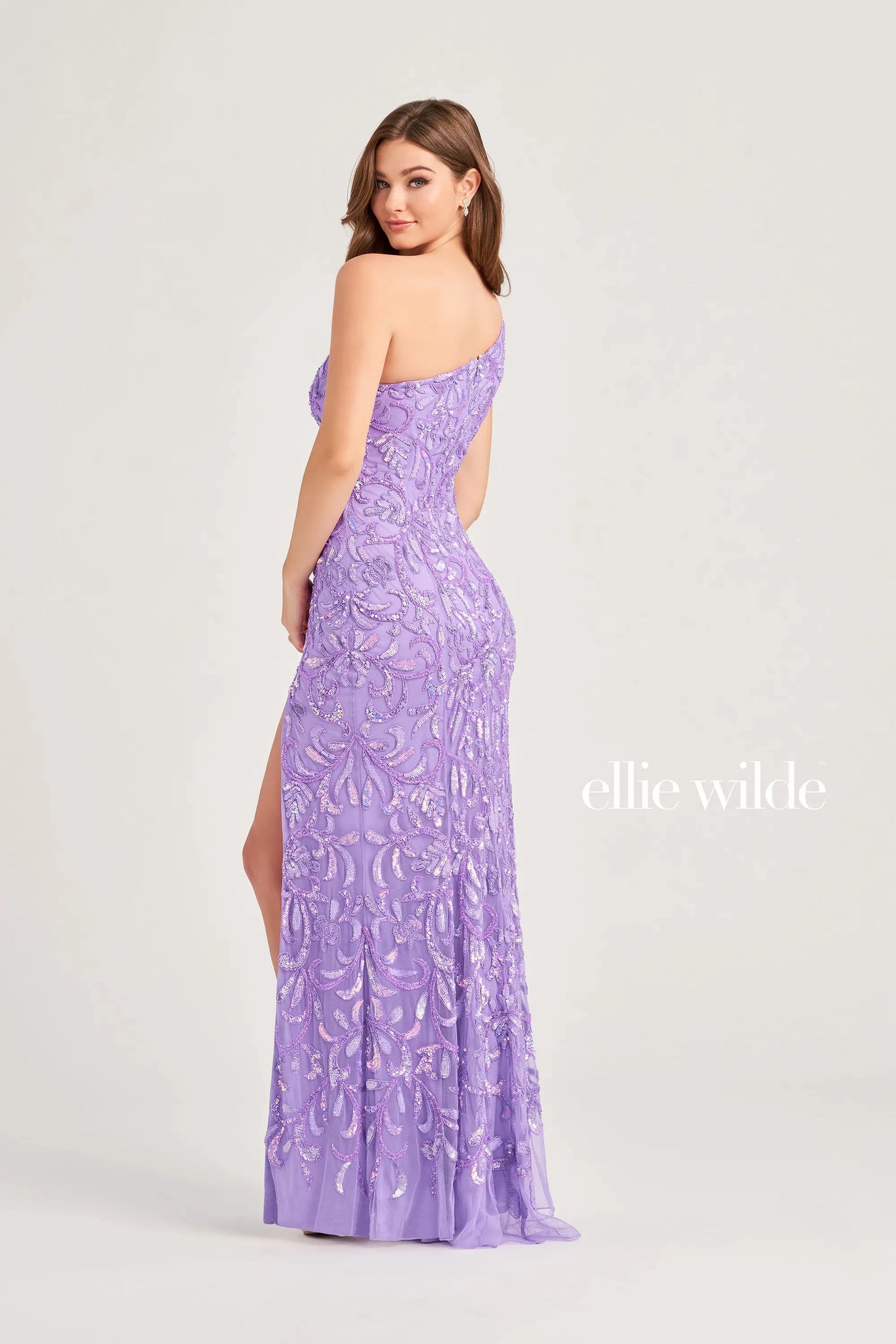 Show up and show off your figure in this stunning Ellie Wilde style EW35021 for your special event. This fitted silhouette showcases an asymmetrical neckline with a single shoulder strap. Dazzling patterns of intricate beadwork are embellished all over adding the perfect shine ensuring you stand out from every angle.