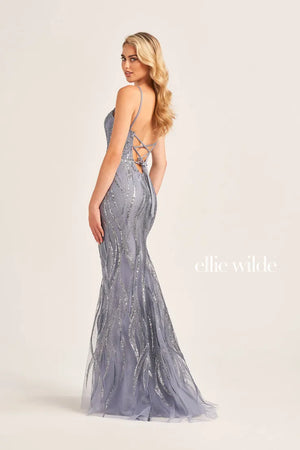 Classy yet still glamorous gown is the perfect choice for your senior prom. Ellie Wilde gown style EW35112 will have all eyes on you. Featuring a classy v cut neckline paired with thin spaghetti straps that create an open lace up back. The fitted silhouette is completely adorned with a beaded sequins to have you shimmer all night long.