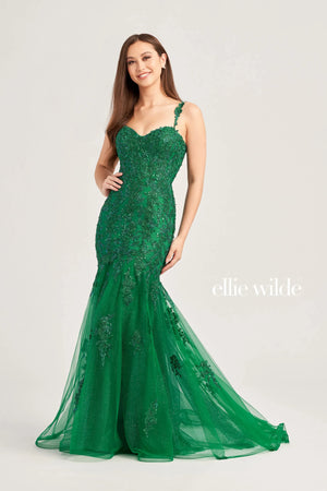 Exude elegance in this elegant Ellie Wilde fitted mermaid dress EW35238. The fitted silhouette is entirely garnished in glistening combinations of beads for an everlasting sparkle while the flowy glittering tulle sweep train follows gracefully behind you. The V-neckline is supported by embellished straps.