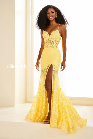 Stay classy when wearing this long fitted dress by Ellie Wilde, style EW36016. Showcasing a modern v- neckline with thin straps leading to a back zipper closure. The see through silhouette of this ensemble will for sure going to hug your body gorgeously. Fully embellished with floral embroidery applique and glistening beadwork. The bottom of this dress has lace and glitter tulle. For the perfect final touch t has a sexy high thigh slit and a classy train.