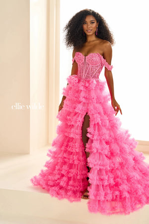 Show off your inner fashionista in this gorgeous A line dress from Ellie Wilde style EW36201. The corset structured bodice is made of sheer illusion with flower appliques adoring it. The ruffled layered aline skirt has a front thigh high side lit and a sweeping train. Included our separate straps to add to the strapless look.