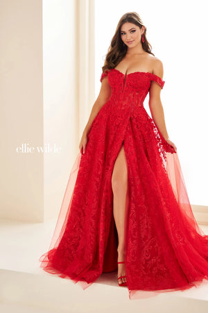Feel dramatic and glamorous like you just stepped off the red carpet in this gorgeous Ellie Wilde a line dress style EW36209. The off the shoulder bodice neckline is bedazzled with gorgeous appliques. The novelty tulle a line skirt makes it stand out from the rest with a thigh high front side slit and long flowing train.