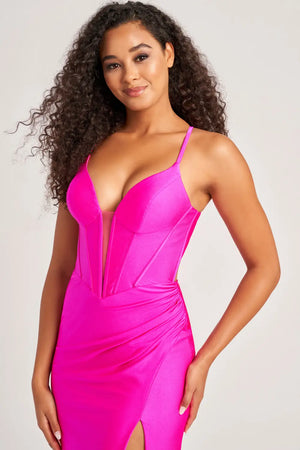 Be bold at your prom and get noticed in this glamorous Colette long dress style CL5204 made in hot colors of stretch jersey fabric. This sleek silhouette features a corset bodice with exposed boning, V neckline, spaghetti straps and large keyhole cutout back. The long curve hugging skirt has a high front side slit, horsehair hem edge and sweep train.