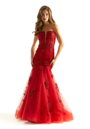 Feel like you just step foot of the red carpet in this fabulous long dress by Morilee, style 49008. Featuring a fitted mermaid silhouette with a strapless scoop neckline. This number is adorned with glistening beadwork and dazzling applique. A corset lace up back is sure to hug the waist gorgeously and give you that hour glass figure.