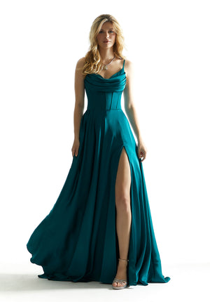 Dance the night away in this fun and elegant Morilee A-line prom dress 49011. The fitted corset bodice features a ruched cowlick V-neckline along with a simple and seamless zip up closure on the back. The flowy A-line skirt features a traditional thigh high slit the pair beautifully with the long sweep train.