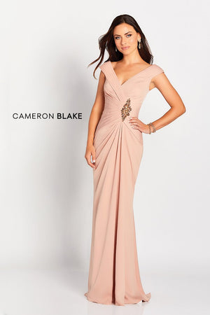 This exquisite tip-of-the-shoulder stretch satin sheath features slight cap sleeves, front and back V-necklines, a directionally gathered bodice adorned with a large beaded accent, an asymmetrically dropped waist, and a draped skirt with a sweep train.  Sizes: 4-20, 16W-26W   Available in Apricot, Purple  If we do not have your desired size or color in stock please call or email us for availability!