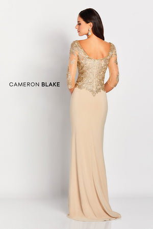 This elegant jersey sheath with lace illusion three quarter sleeves features a beaded wide V-neckline, a dropped waist bodice adorned with stunning metallic lace applique'ss and beading, a beaded scoop back and a sweep train.  Sizes: 4-20   Available in Gold, Navy, Silver  If we do not have your desired size or color in stock please call or email us for availability!