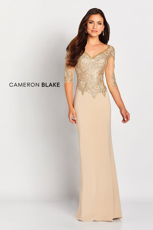 This elegant jersey sheath with lace illusion three quarter sleeves features a beaded wide V-neckline, a dropped waist bodice adorned with stunning metallic lace applique'ss and beading, a beaded scoop back and a sweep train.  Sizes: 4-20   Available in Gold, Navy, Silver  If we do not have your desired size or color in stock please call or email us for availability!