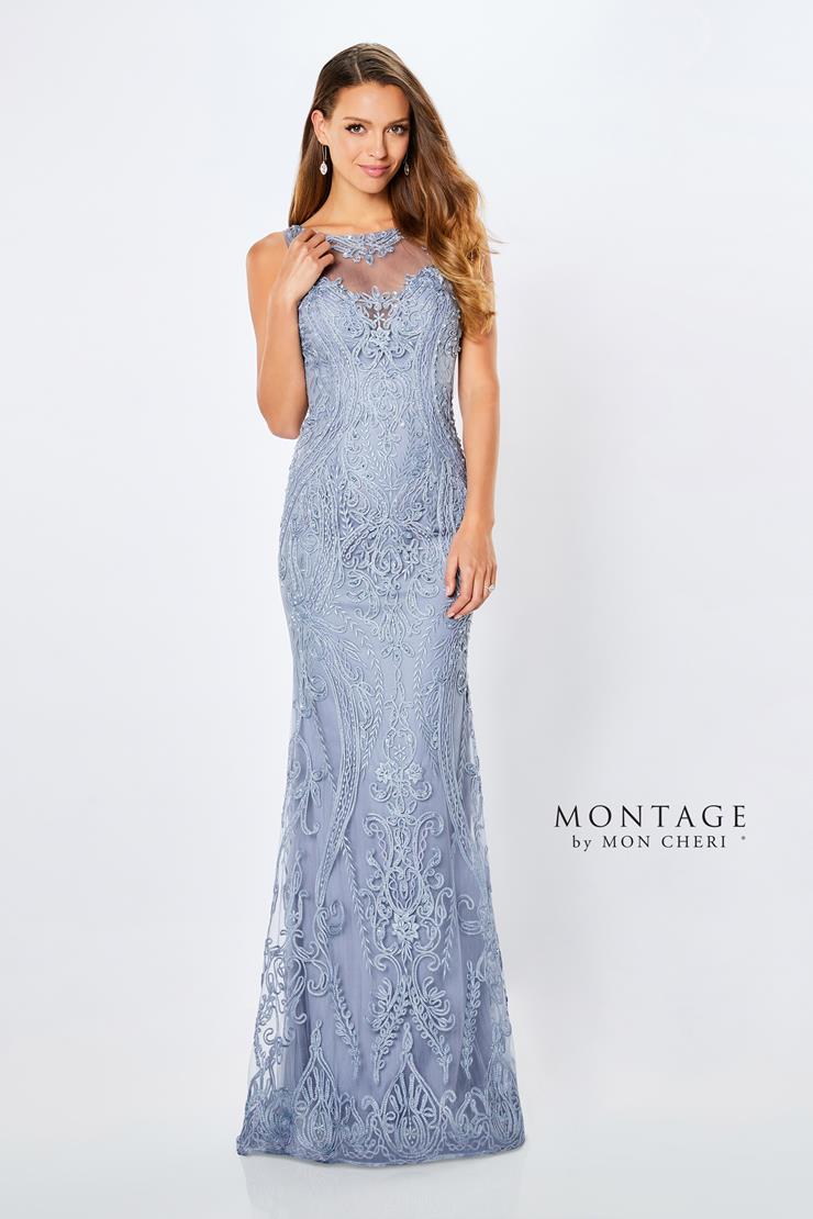  This sheath dress is sexy while still being covered. The dress is a beaded lace, ribbon, and tulle gown featuring an illusion v-neckline, and a keyhole back. Shawl and separate lace flutter sleeves included.